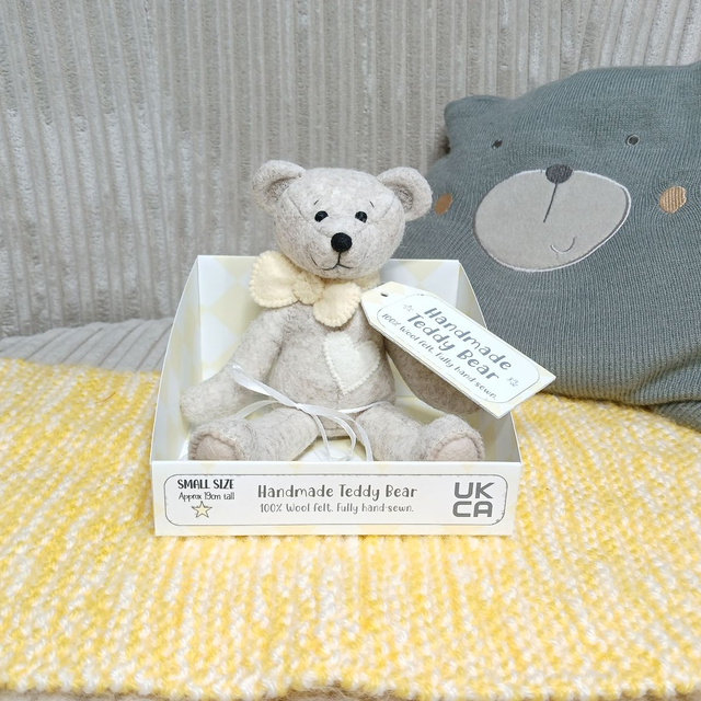 *No name* traditional beige bear. Pastel yellow bow tie. Small size, handmade teddy bear. UKCA. Tray base. Standard Wool Felt. Beige. Cream.