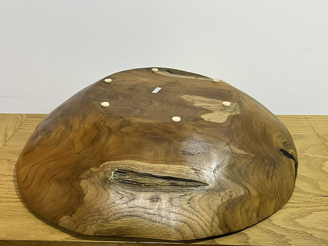 Fruit bowl made from teak tree root.