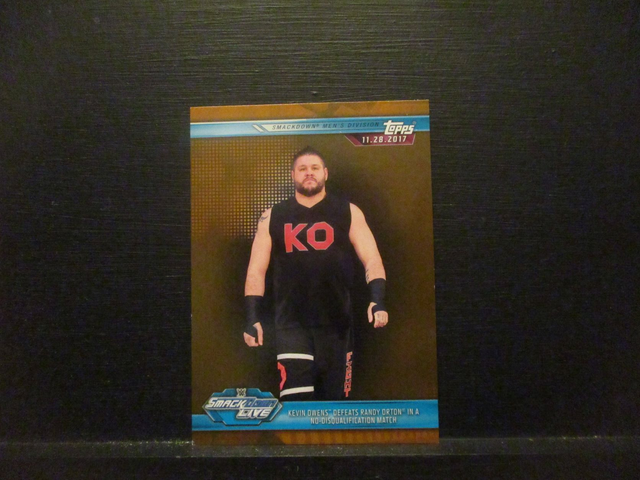 Kevin Owens Defeats Randy Orton In A No-Disqualification Match - Brown Champions Original Trading Card #73
