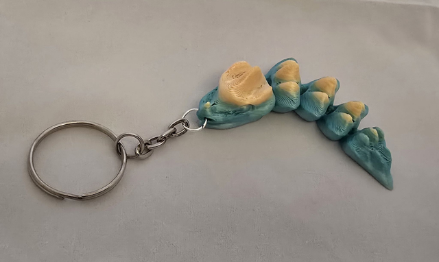 Porte clé dragon flexible