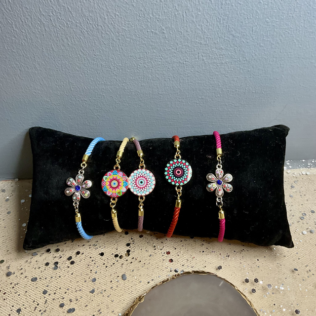 Handmade adjustable cord bracelets.