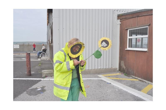 15 by 10 inch print. Weymouth sunflower woman.