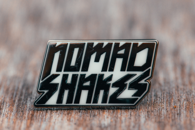 Nomad Pin Badge