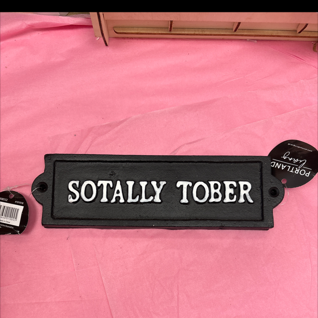 Sotally tober cast iron sign 