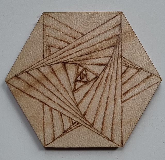 Magnet with geometric star design 