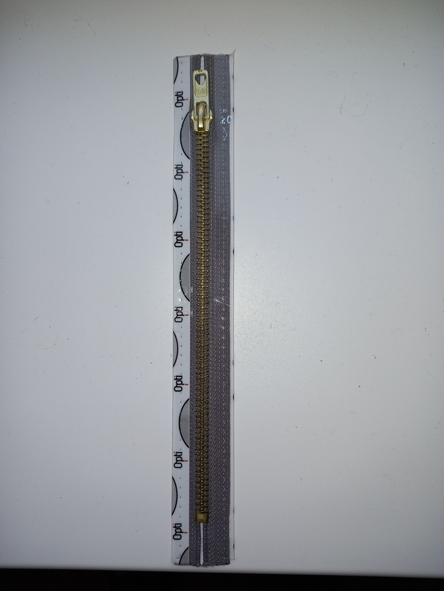 M60 / kleur 4 Opti rits metaal (goudkleurig) lichtgrijs