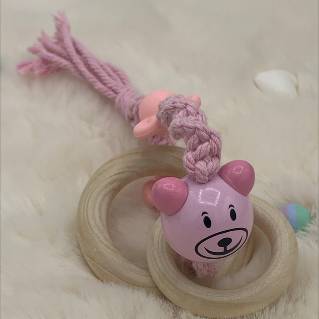 Anneaux dentitions rose avec perles 