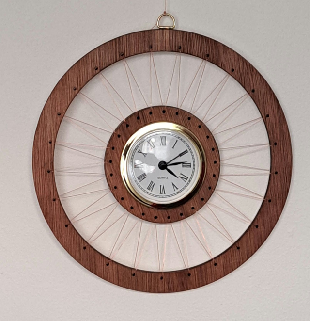 Spoked wheel Clock