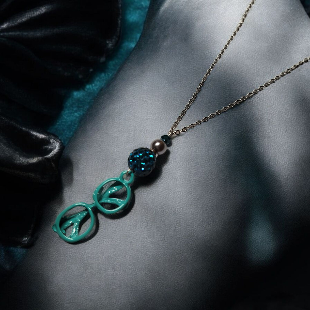 Collier acier inoxydable et cristal vert canard lunettes