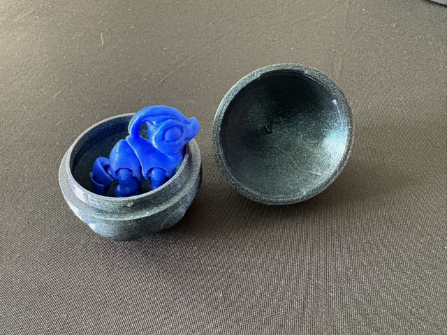 Mystery  egg with articulated animal 