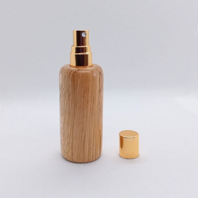 Atomiseur en chêne monture dorée