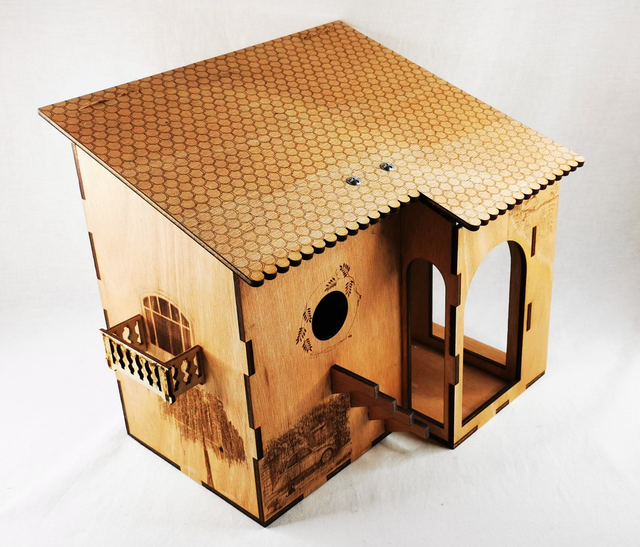 Nichoir à oiseaux et sa &quot;pièce&quot; mangeoire