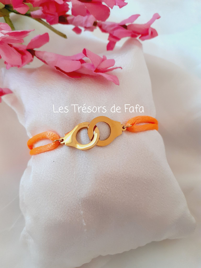 Bracelet menotte cordon orange fluo