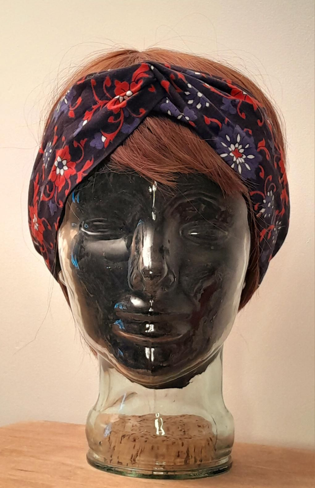 Bandeau torsadé noir fleurs roses/violettes