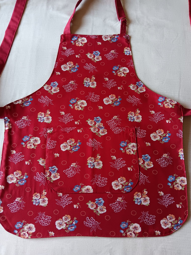 Childs Kitchen Play Apron Burgundy Flower Patterned Cotton Fabric with Front pocket and Burgundy lining, waist ties and adjustable neck ties 