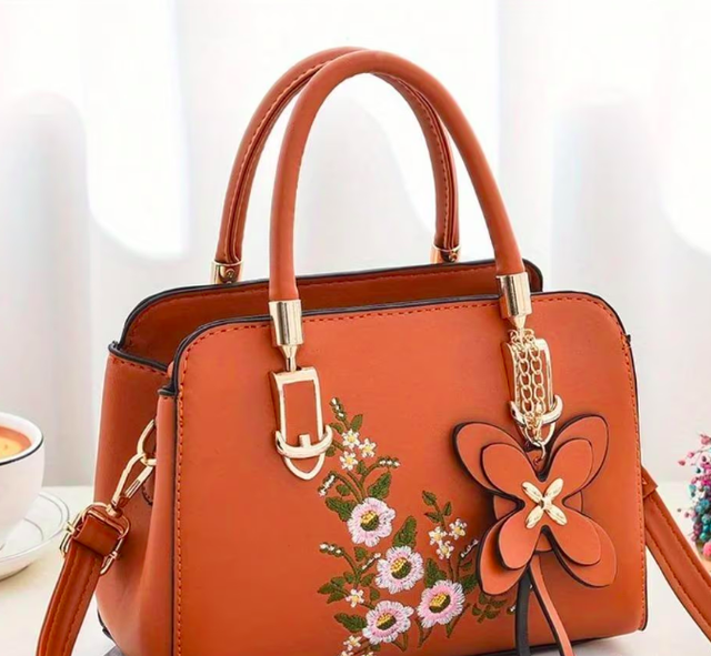 Elegante schoudertas bloemenpatroon van kunstleer (22x16cm) oranje