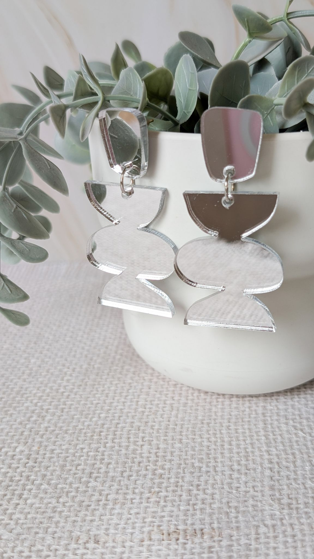 Boucles d&#039;oreilles argentées en plexi