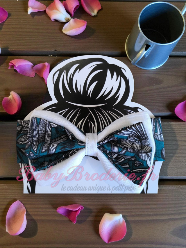 Bandeau bébé blanc et motif gris sur fond bleu foncé