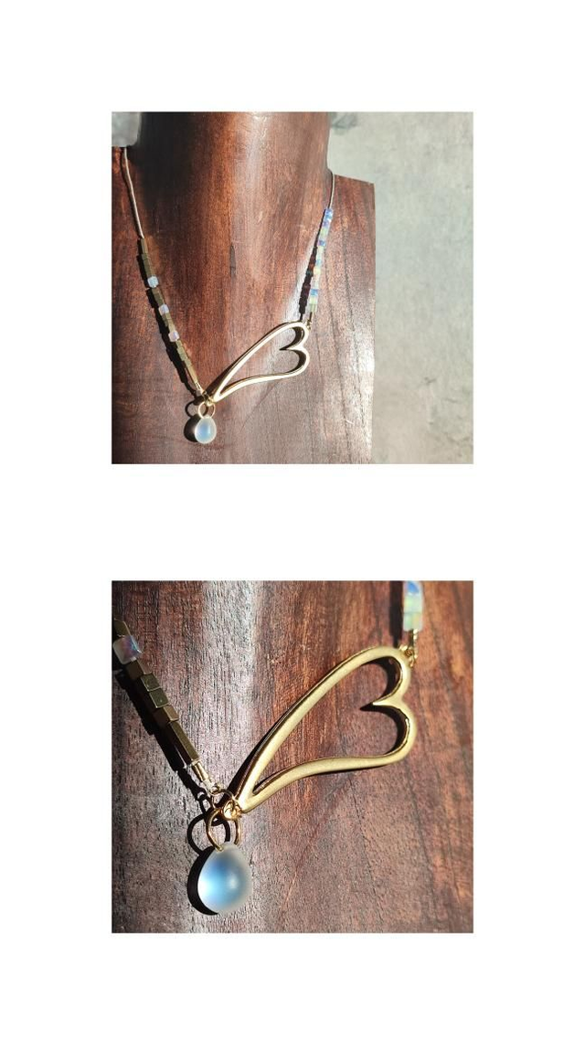 Collier coeur , goutte en verre transparent, perles en verre nacré et hématite doré  ( pierre naturelle) monté sur fil de lin réglable avec chaîne d'extension en acier inoxydable argenté 