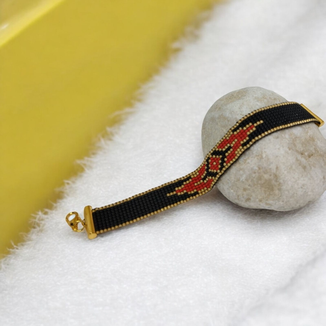 Bracelet noir, rouge et or