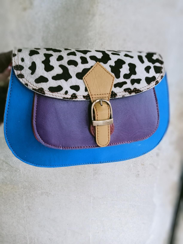 Mala em pele colorida 