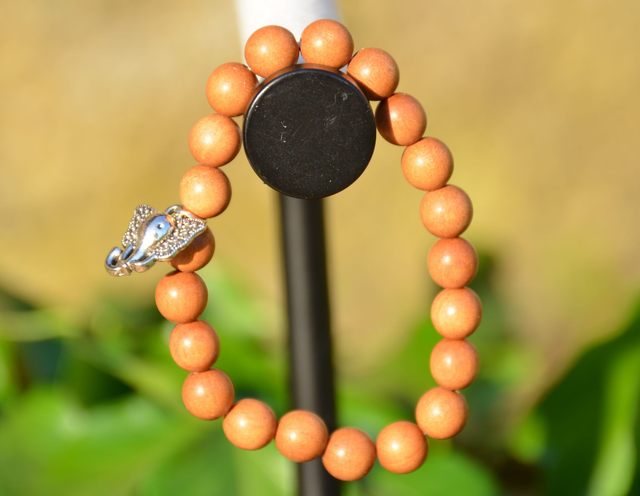 Mala bracelet élastique Sandelwood avec Ganesh