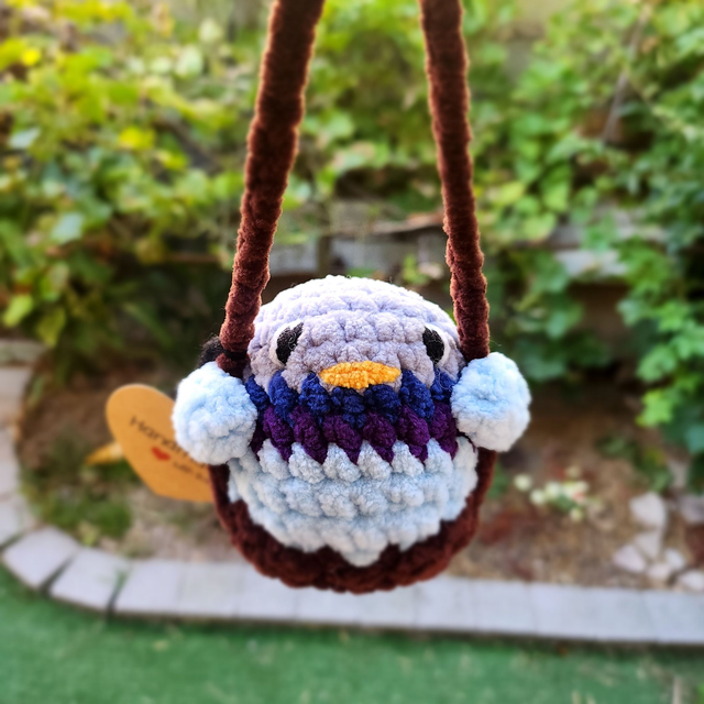 Attache rétroviseur pigeon