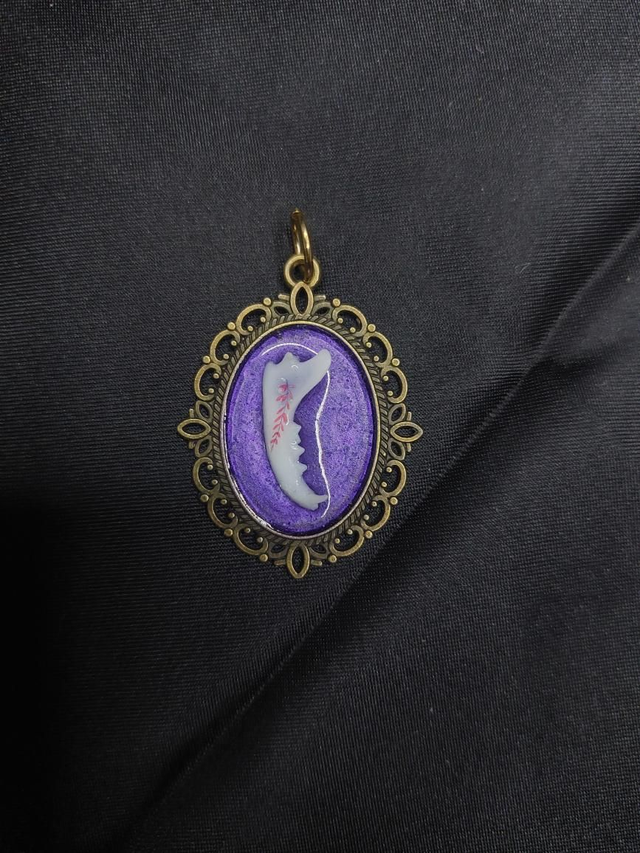 Pendentif mâchoire renard violet