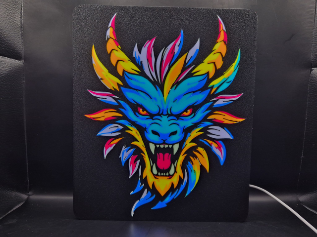 Light Up Sign Of A Colourful Dragons Head