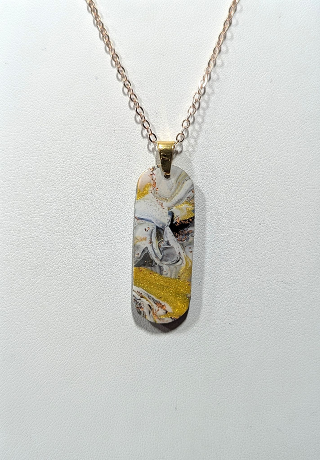 Pendentif long marbré réversible