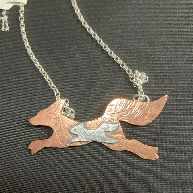 Copper running fox
