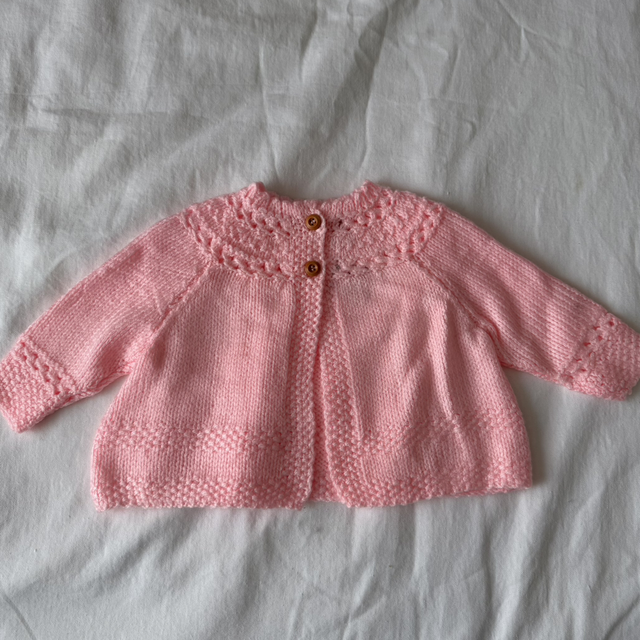 Pink knitted baby matinee jacket 
