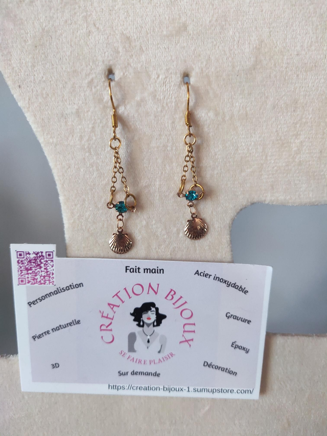 Boucle d'oreille pendante strass bleu