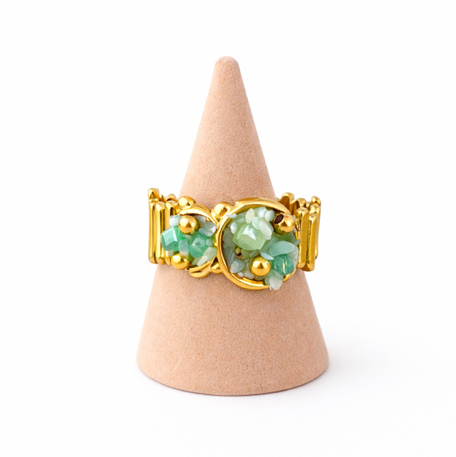 Anillo acero dorado y piedras verdes