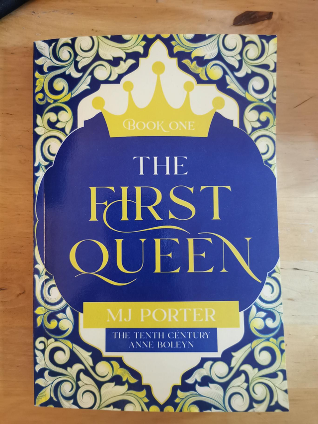 The First Queen Signed paperback with the new cover