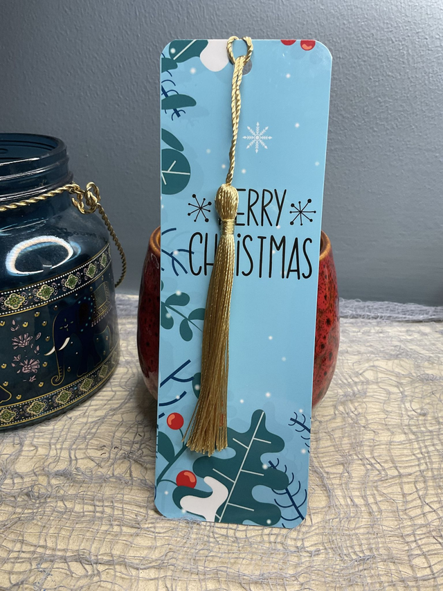 Handmade laminated Christmas bookmarks. Beautiful gift for book lovers.