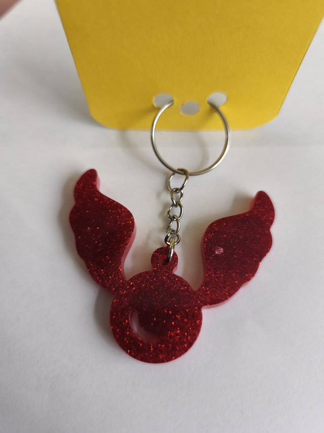 Porte-clé Vif d'or rouge pailleté 