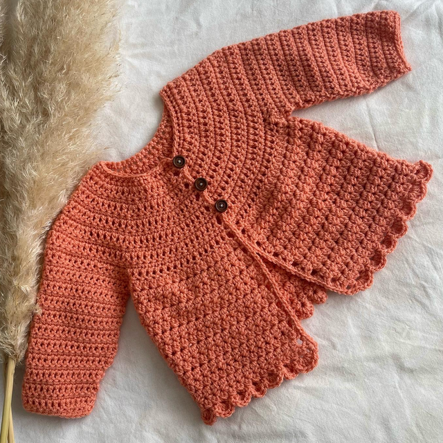 Coral crochet matinee jacket