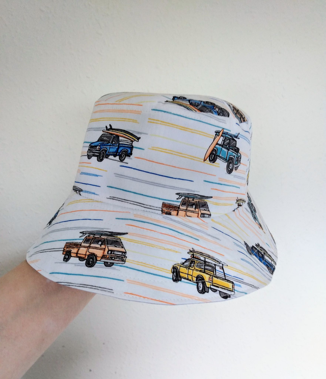 Hat - approx 5-8 yrs.   Trucks and surfboards