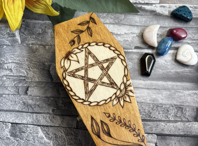 Coffin box with pentacle, flowers and vines 