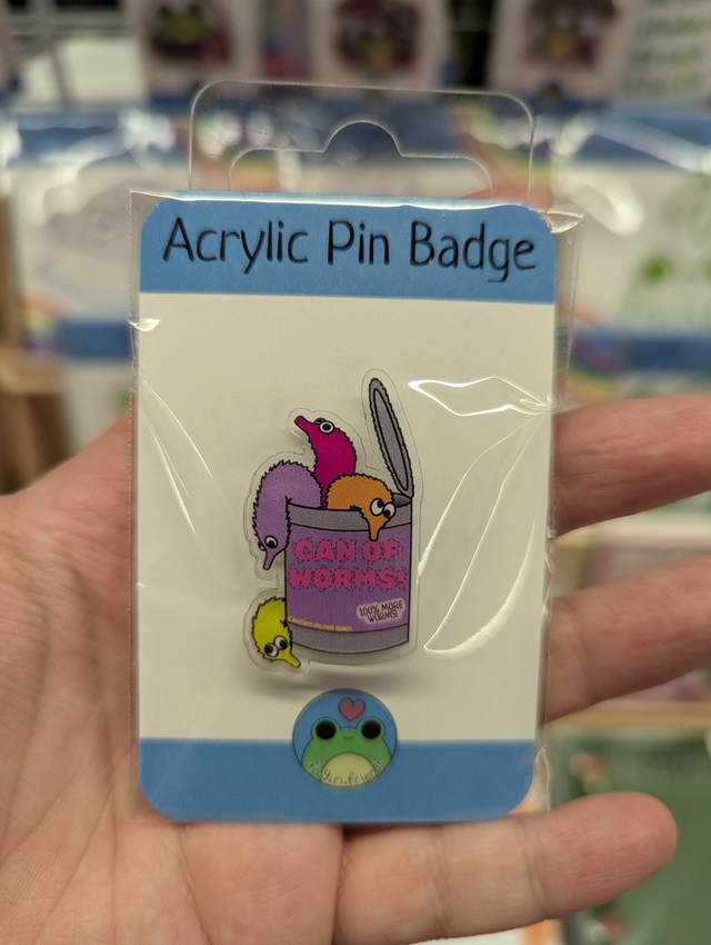 Can of worms pin badge 