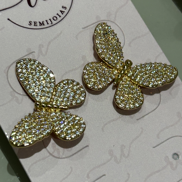 Brinco borboleta cravejado - banho flash Disp dourado e prateado