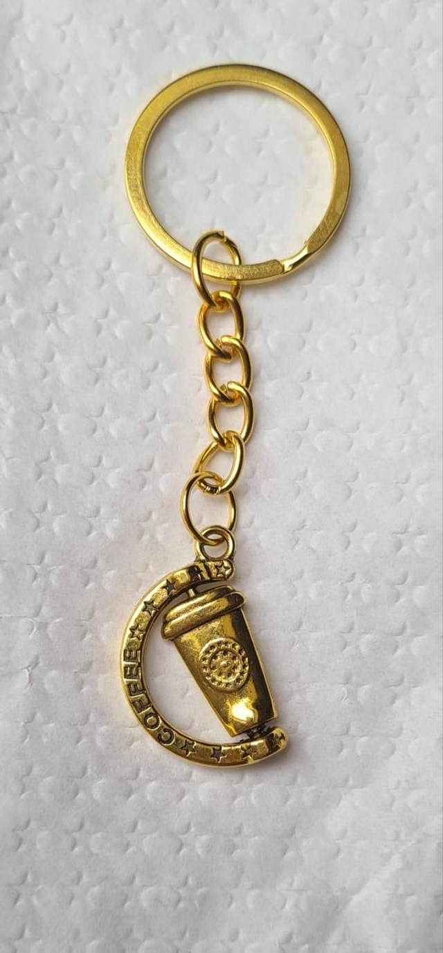Keyring / bag charm gold coffee cup fidget spinner