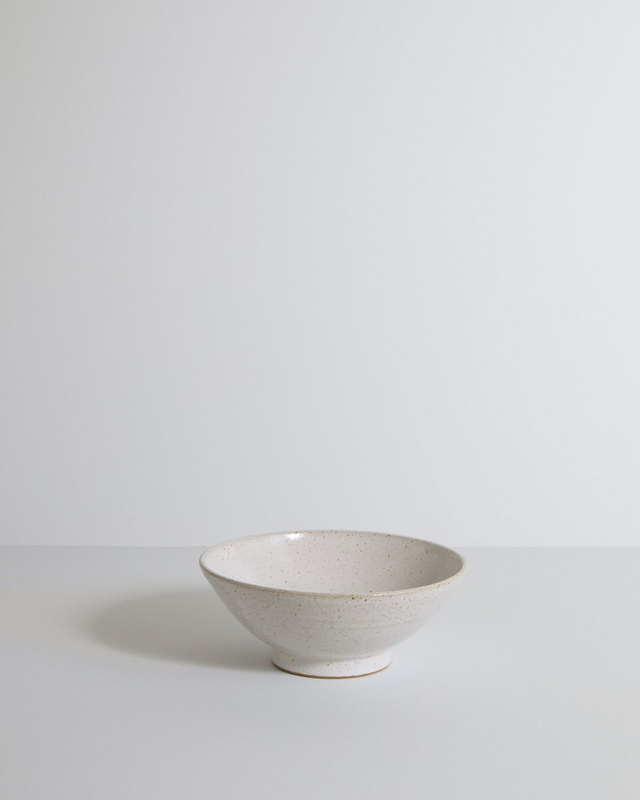 White speckled bowl with foot