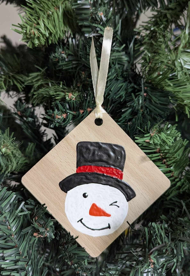 Tête bonhomme de neige 2024