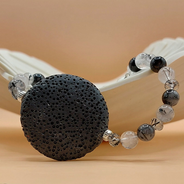 Lava (black), tourmalinated quartz and sterling silver beaded bracelet