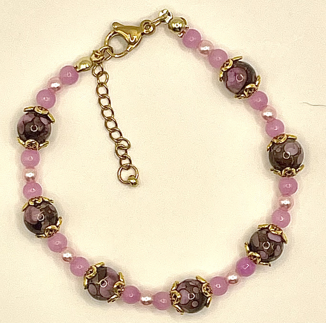 B134 - Bracelet perle verte ton rose