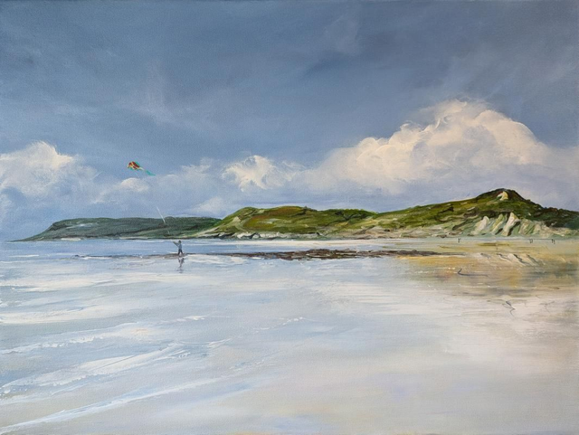 Kite flyer on Caswell Bay 