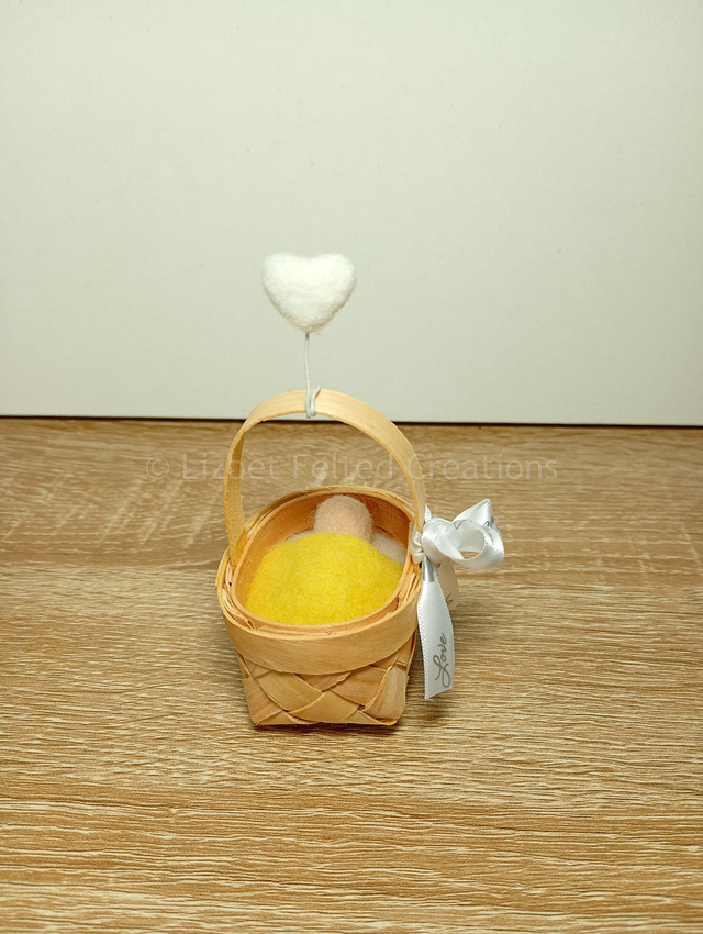 Baby in a basket decoration
