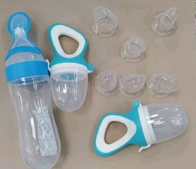 Baby squeeze feeding bottle with 2 dummy pacifiers food/fruit feeder &amp;6 nipples.